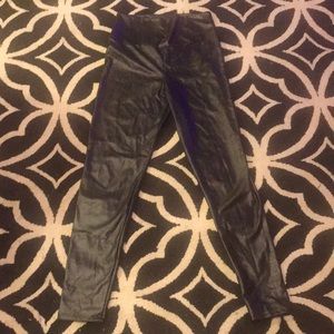 Super stretchy sexy black leggings of a questionable size fit for a rock star